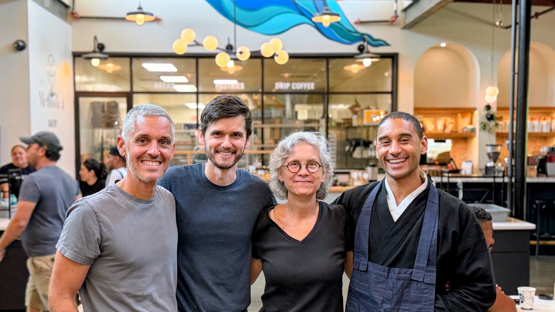 Jay, Adam, Jennie, and Genjo standing together after the first sitting.